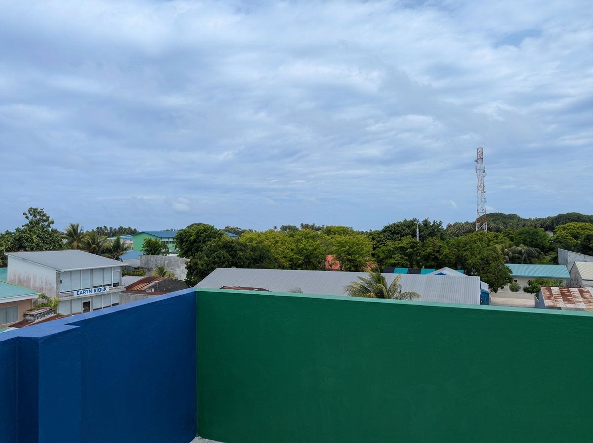 The town of Manadhoo seen from the rooftop terrace at Dhoores